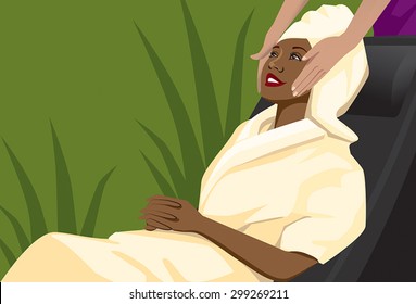 African American Woman at a day spa getting a facial