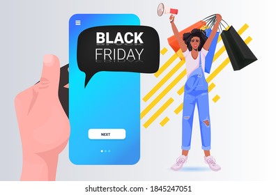 african american woman with loudspeaker and shopping bags buying online in mobile app black friday big sale concept full length horizontal vector illustration