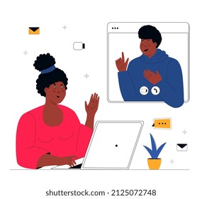 African American woman makes a conference video call. Remote teamwork. Colleagues talk to each other on the computer screen. Working from home.