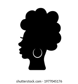 African American woman silhouette with curly afro hair and traditional earring. Young black woman profile isolated on white. Vector illustration.