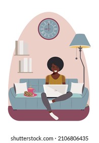 An African American woman sits on a comfortable blue sofa and works with a laptop at home during quarantine due to the coronavirus. Modern concept of distance learning online. Vector.