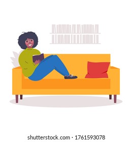 African American young woman is sitting on a sofa and reading a book. Character woman resting at home. Flat vector illustration isolated on white background.