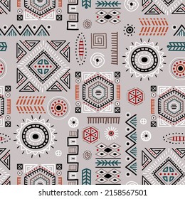 African art decoration pattern tribal geometric shapes seamless background. Colored flat vector boho symbols illustrations. Ancient indian shapes and animal print doodles.