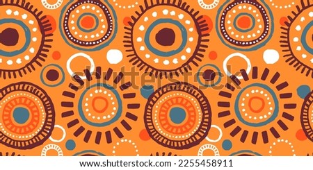 African art style seamless pattern. Traditional hand drawn tribal background with circle sun or mandala decoration. Ethnic culture fashion print, textile, wrapping paper backdrop.