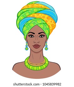 African beauty. Animation portrait of the young black woman in a turban. Vector color illustration isolated on a white background. Print, poster, t-shirt, card.