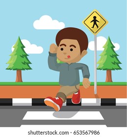 african boy crossing the road