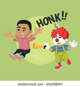 african boy getting surprise by clown