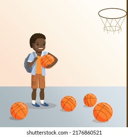 African boy happily came to the school basketball court for training.