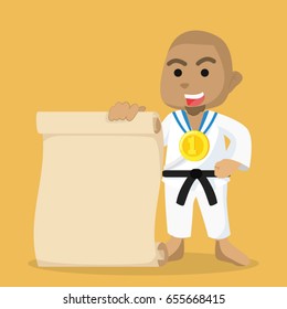 african boy karate champ holding paper