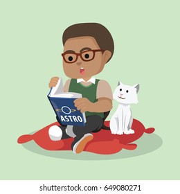african boy reading while cat watching