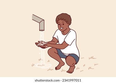 African boy sits near clean water faucet, rejoicing at opportunity to quench thirst during drought. Child drinks and draws water in palm of hand to drink, for concept acosania helping children Africa