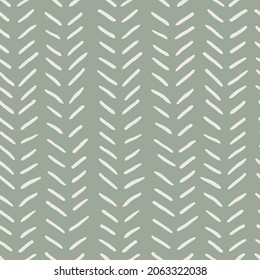 African brush stroke mud cloth fabric pattern. Ethnic boho seamless vector pattern in sage green and beige, tribal.