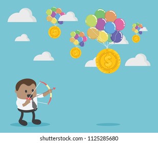African businessman aiming at target with bow and arrow