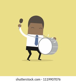 African businessman with big drum.