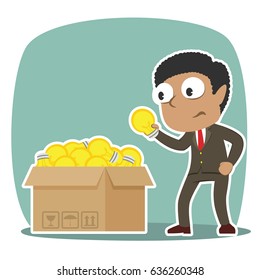 african businessman choosing bulb 