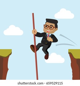african businessman crossing the cliff