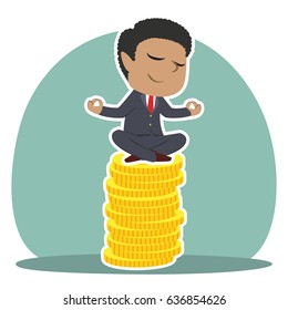african businessman doing yoga on coins