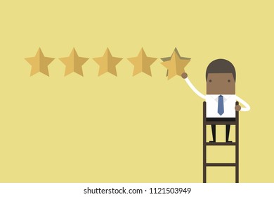 African businessman giving five star rating.