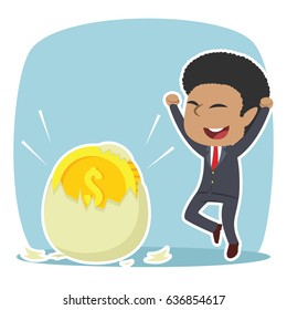 african businessman happy got his coin hatched from egg