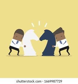 African businessman with horse chess and fighting each other. Business competition concept.