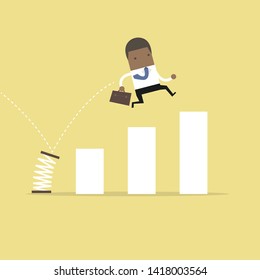 African businessman jump spring across the growing bar chart. Growth for business concept.