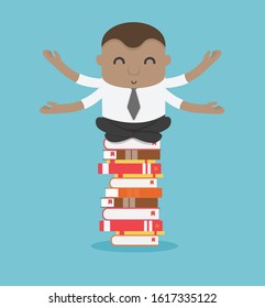 african businessman on stack of book