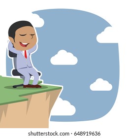 african businessman sitting on chair and enjoying scenery from cliff edge