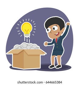 african businesswoman found shining bulb among dim bulbs