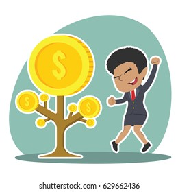 african businesswoman happy her coin tree grow