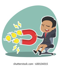 african businesswoman relaxing using magnet to attract ideas
