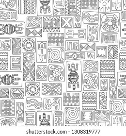 African ethnic seamless pattern. Hand drawn tribal symbols in African style on a white background. Vector illustration.  