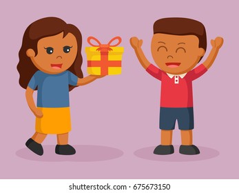 african girl giving gift to african boy