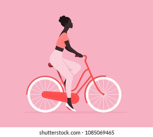 The African girl is riding a bicycle. Rest and vacation. Healthy lifestyle. Vector flat illustration.