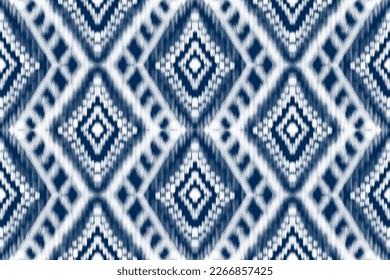 African Ikat paisley embroidery on navy blue background.Thai geometric ethnic oriental seamless pattern traditional.Aztec style abstract vector illustration, design for printing business.