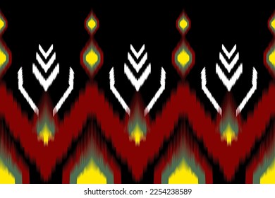 African Ikat Paisley embroidery pattern on black background, traditional seamless geometric pattern, Aztec abstract pattern.