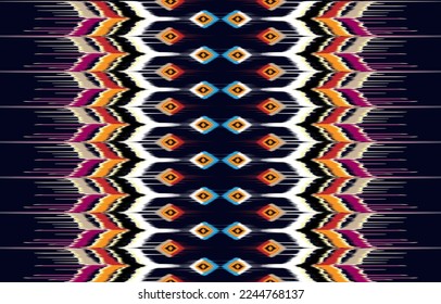 African Ikat paisley seamless pattern.
geometric ethnic oriental pattern traditional on blue background.
Aztec style abstract vector illustration.design for texture,fabric,
clothing,wrapping,carpet