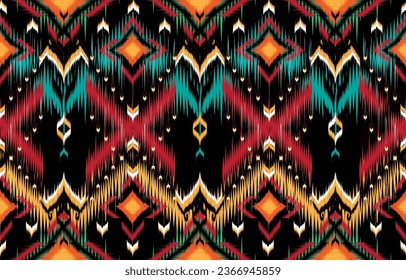 African Ikat paisley seamless pattern.
geometric ethnic oriental pattern traditional on blue background.
Aztec style abstract vector illustration.design for texture,fabric,
clothing,wrapping,carpet.