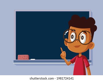 African Male Student Standing in front of a Blackboard. Happy schoolboy presenting her assignment in class for oral examination project
