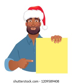 African man in christmas hat holding blank banner. African american man with board. Finger pointing vector illustration