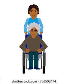 African man taking care of an elderly man in a wheelchair