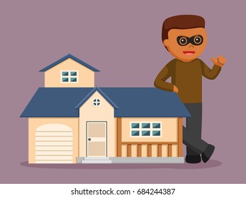 african man thief standing beside miniature house