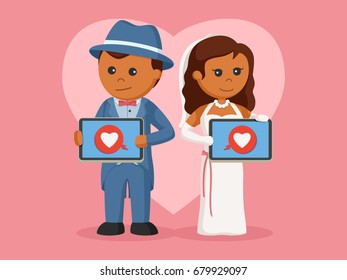 african married couple with love icon on tablet