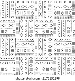 African mud cloth inspired geometric tribal vibes motif vector seamless pattern. Ethnic ornamental background. Boho traditional folk art surface design for home decor.