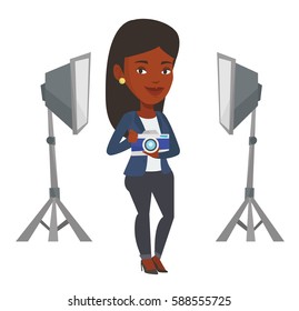 African photographer holding camera in photo studio. Photographer using professional camera in the studio. Photographer taking a photo. Vector flat design illustration isolated on white background.