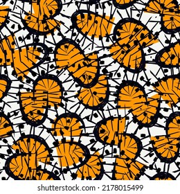 African style seamless pattern. Bright ethnic, tribal ornament. Floral motif ornamental background. Ankara wax inspired fabric, cloth, textile print, digital paper. Freehand design abstract wallpaper