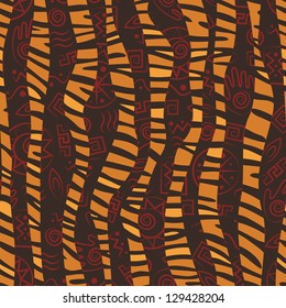 African style seamless pattern with wild animals skins and ancient tribal symbols
