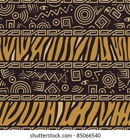 African style seamless pattern with wild animals skins and ancient symbols