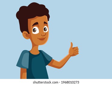 African Teen Boy Holding Thumbs up Doing OK Sign. Happy adolescent making a non verbal gesture of appreciation
