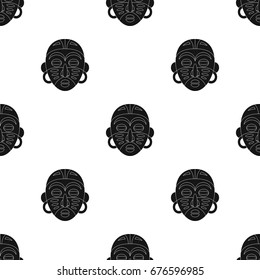 African tribal mask.African safari single icon in black style vector symbol stock illustration web.