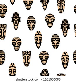 African tribal masks seamless pattern. White background. Colorful vector illustration.